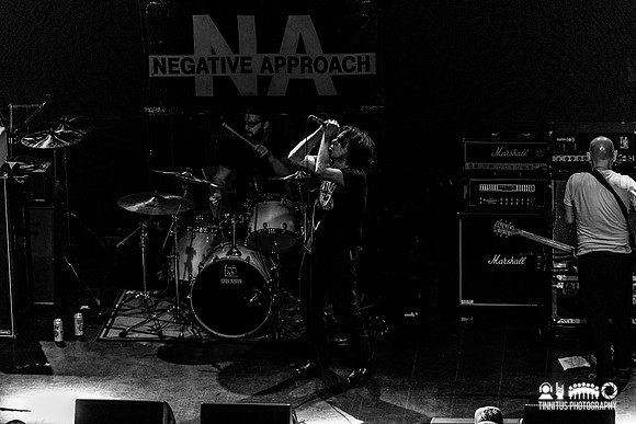 Negative Approach in concert