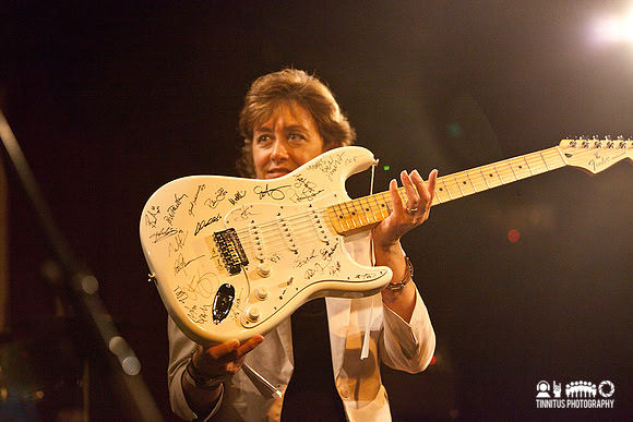 An autographed guitar auctioned off at the Hot Stove Cool Music