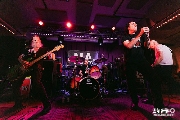 Negative Approach in concert