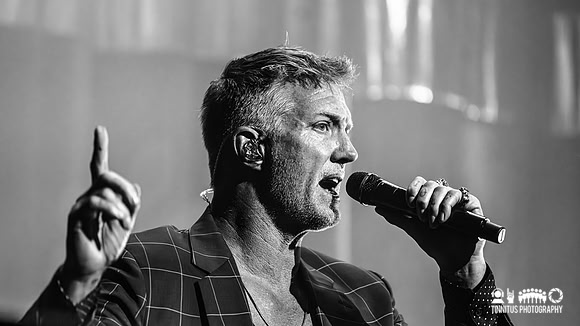Queens of the Stone Age performing In The Catacombs