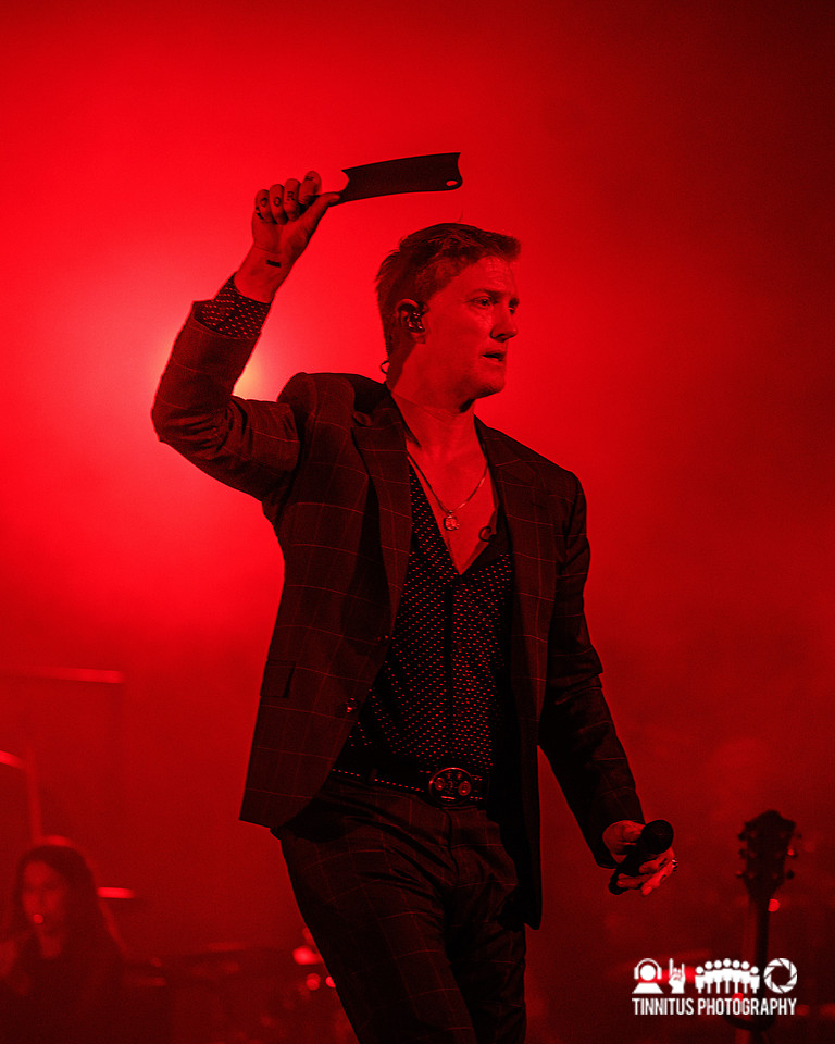 Queens of the Stone Age performing In The Catacombs
