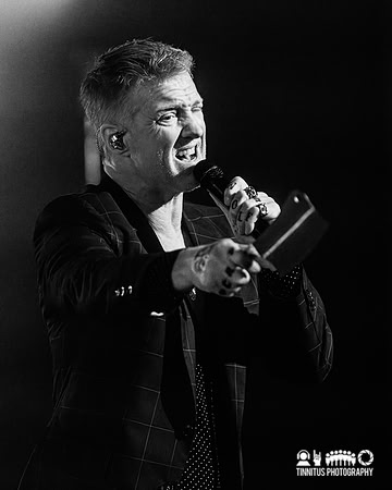 Queens of the Stone Age performing In The Catacombs