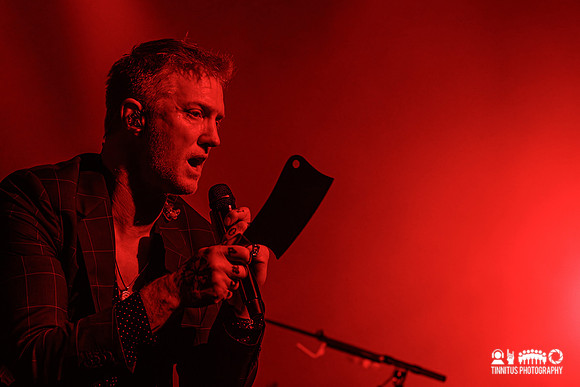 Queens of the Stone Age performing In The Catacombs