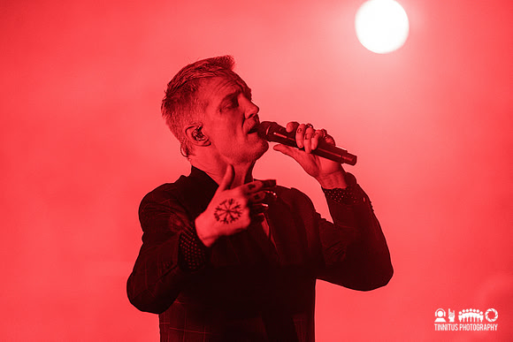 Queens of the Stone Age performing In The Catacombs