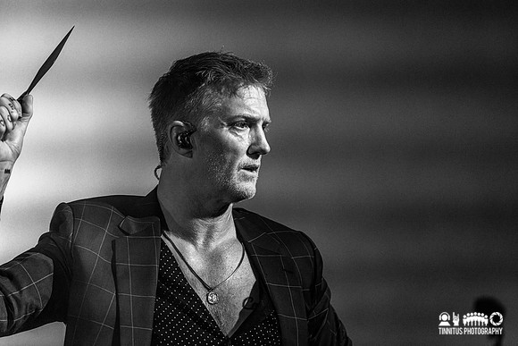 Queens of the Stone Age performing In The Catacombs