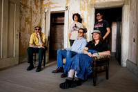 Ryan Davis and Roadhouse Band offstage at Newport Folk Festival