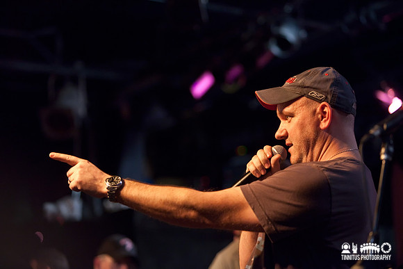 Mike O'Malley directs the auction action at the Hot Stove/Cool M