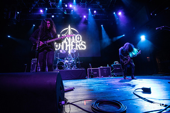 Unto Others in concert