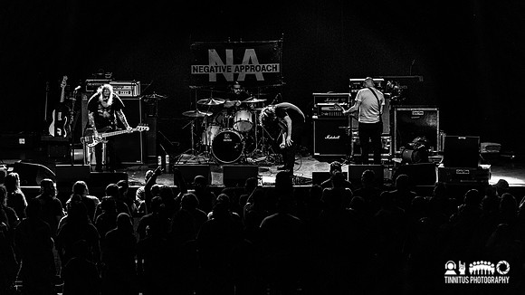 Negative Approach in concert
