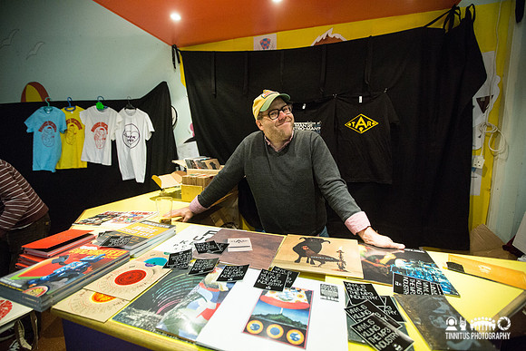 Henry Owings at the Chunklet merch table