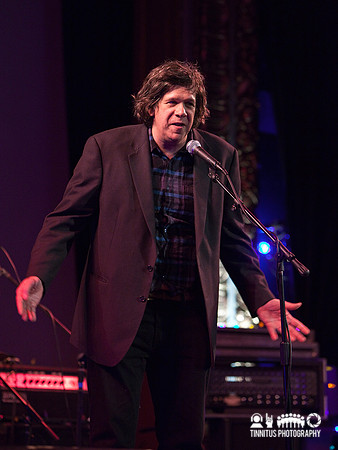 Brett Milano emcee'ing the benefit concert for The Children's Ro