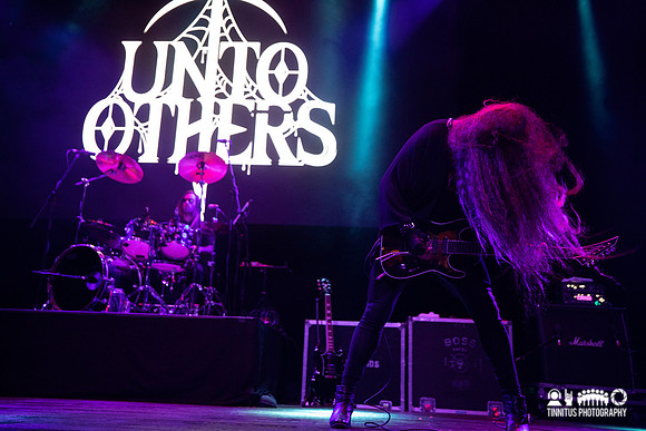 Unto Others in concert