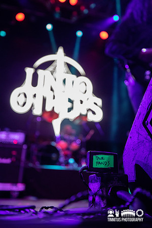 Unto Others in concert
