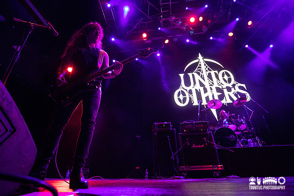 Unto Others in concert