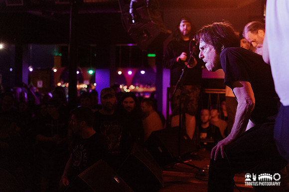 Negative Approach in concert