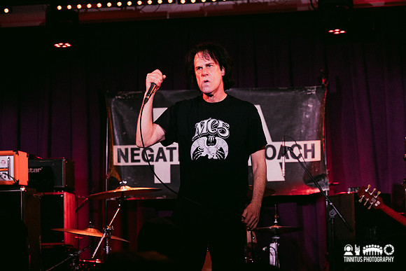 Negative Approach in concert
